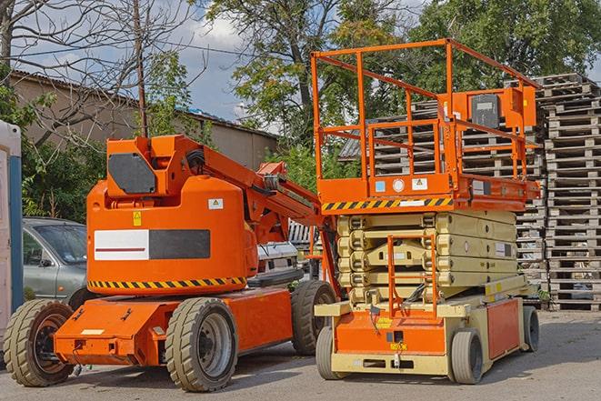 forklift operator working in busy warehouse environment in Greenbelt